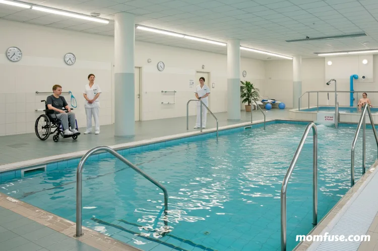 A modern hydrotherapy facility with wheelchair-accessible ramps, clean water, and trained staff ensuring safety.