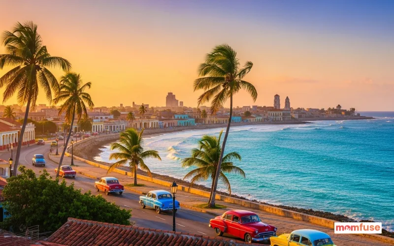 Tropical view of Cuba with colorful colonial towns, turquoise coastline, classic vintage cars, palm trees.