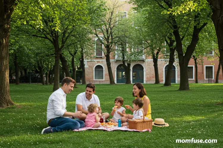 Family with kids having a picnic in Giardini Pubblici in Venice.