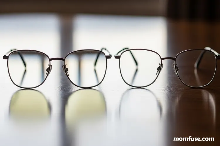 Two pairs of glasses side by side: one showing heavy glare and reflections, the other crystal clear with anti-reflective coating.