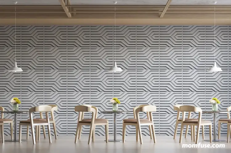 Dining area with geometric wall design.