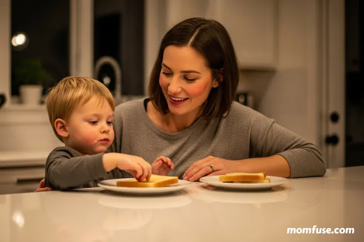 A mother and child sharing a late-night snack at the kitchen island.