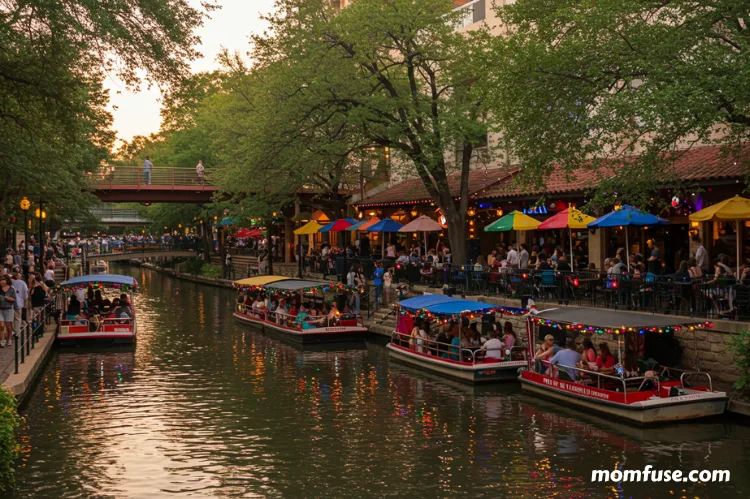 River Walk scene with colorful boats and outdoor cafes The with tourists. family summer vacation USA