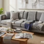 A realistic living room scene with a modern sofa surrounded by fabric swatches.