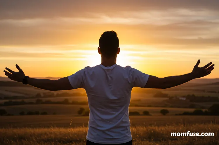 A person standing at sunrise with open arms, symbolizing hope, healing, and a fresh start.